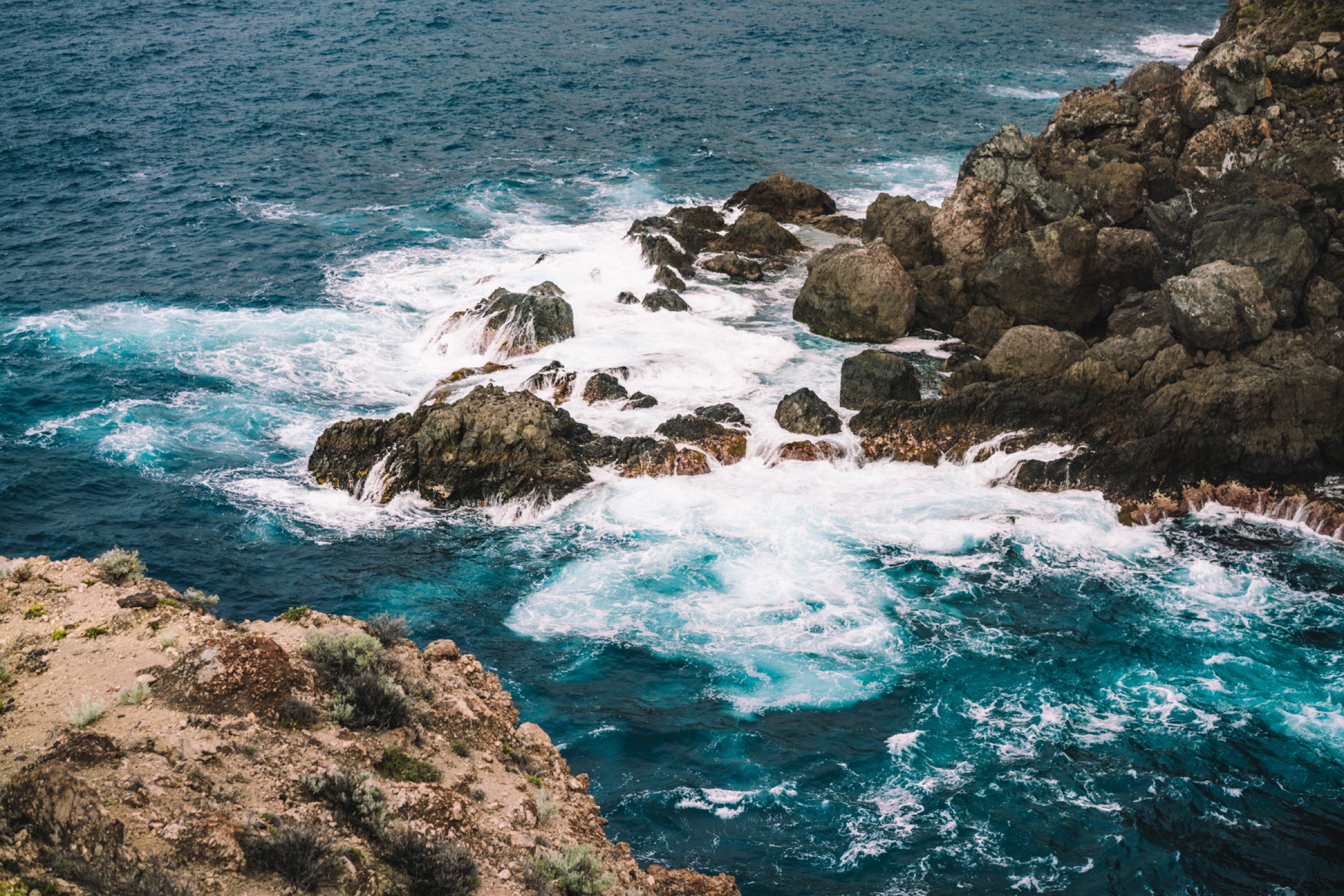 Atlantic waves breaking over volcanic rock on the Tenerife coast